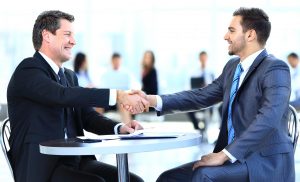 Business colleagues sitting at a table during a meeting